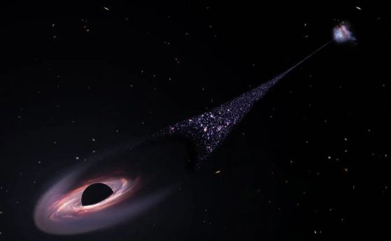 Концепция на художник за свръхмасивна черна дупка - беглец с шлейф звезди след нея