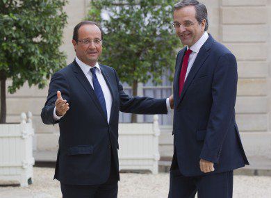 Френският президент Франсоа Оланд и гръцкият премиер Андонис Самарас. Снимка: АП