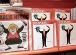 Меркел държи отрязаната глава на Шулц на корицата на "Шарли Ебдо"