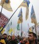 Хиляди украинци на протест срещу корупцията, двама души пострадаха при сблъсъци с полицията
