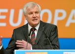 Германският вътрешен министър се оттегля като лидер на коалиционната на Мекрел партия ХСС