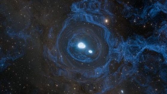 Вторият етап на свръхкилоновата, две неутронни звезди заедно се движат спирално, приближавайки се една към друга, и се сливат. Кредит: Caltech/K. Miller and R. Hurt (IPAC)