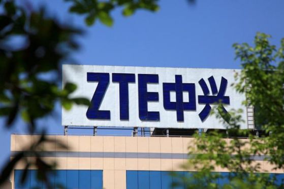 FILE PHOTO: The logo of China's ZTE Corp is seen on a building in Nanjing