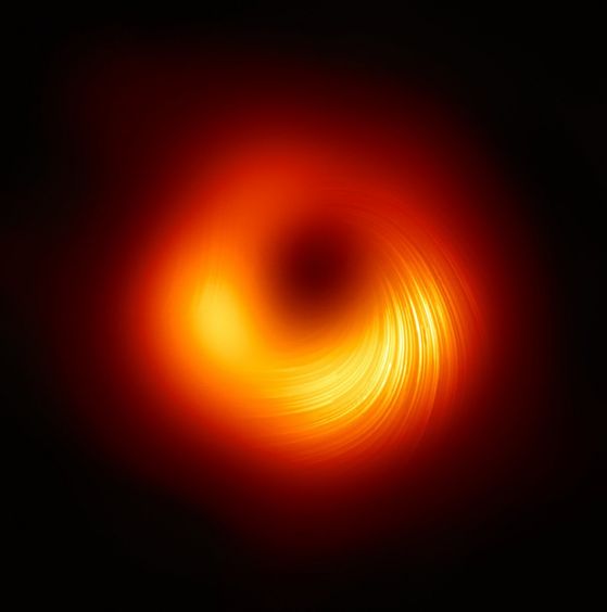 Нова снимка на черната дупка на M87 показва магнитните полета по ръба й