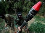 Членове на "Хамас" при обстрел срещу Израел с ракети, Снимка: The Telegraph, Архив