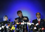 Брифинга в Куала Лумпур, на който главният полицейски инспектор обявява, че мистерията с полет 370 може никога да не бъде разгадана.