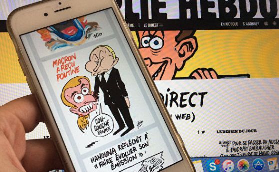 "Шарли Ебдо" изобрази Макрон като кученце, хапещо Путин