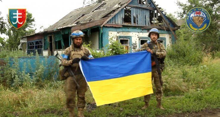 Още едно село е освободено от окупаторите - гласи текстът под тази снимка в агенция УНИАН