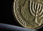 За да стабилизира шекела, Израелската централна банка продава 30 млрд. долара