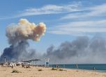 Стълб дим се издига над руската военновъздушна база "Саки" в Крим след украинска атака на 9 август 2022 г. 