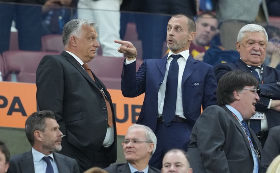 Унгарският премиер Виктор Орбан в дружески разговор с президента на УЕФА
