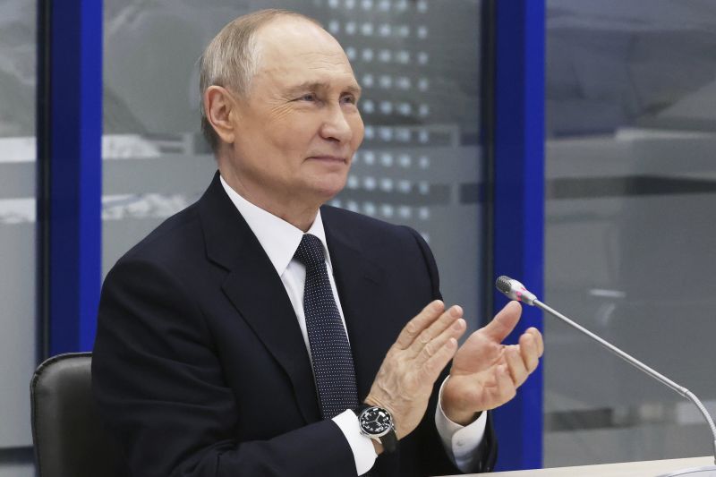 Владимир Путин