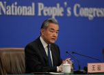 Министърът на външните работи на Китай Ван И. Снимка: AP/Andy Wong
