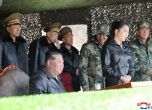 Севернокорейския лидер Ким Чен Ун и  дъщеря му Джу Е