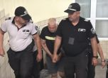 Полицията води обвиняемия към делото - БГНЕС/Иван Янев 