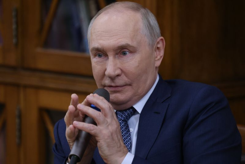 Путин