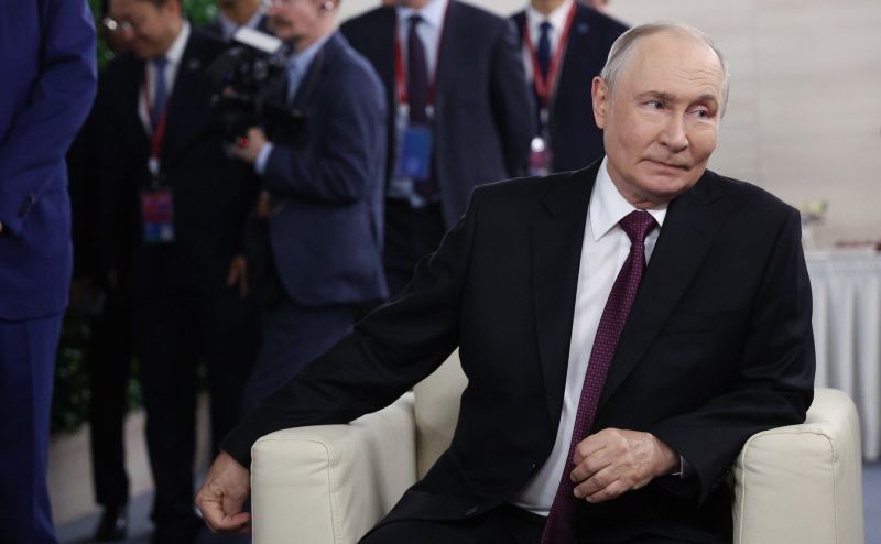 Путин