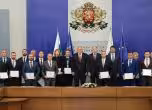 награди