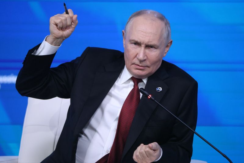 Путин