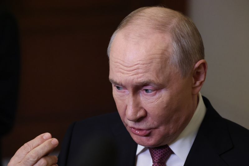 Путин