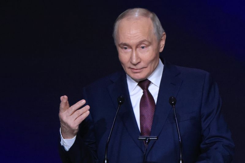 Путин