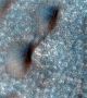 Камерата с висока резолюция, монтирана на автоматичната междупланетна станция Mars Reconnaissance Orbiter прави снимки на повърхността на Червената планета от 2006 г. насам. Наскоро НАСА отвори достъп до архива си, където има повече от 1000 снимки.  Снимка: NASA/JPL/University of Arizona
