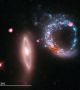 По случай св. Валентин - ​​набор романтични астрономически снимки и изгледи на Земята от космоса.
Това изображение на двете галактики, които формират Arp 147 показва огромен космически пръстен от звезди (в синьо) и черни дупки (розово).  Снимка: NASA / ESA 