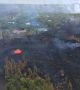От началото на изригването на вулкана Килауеа общо 12 пукнатини се отвориха и изливат непрекъснато лава върху околните пътища гори и къщи на Големия остров.

Настъпващите огнени разтопени скали предизвикват пожари - общо 35 сгради, повечето от които домове, са изгорели, откакто започна изригването на 3 май.  Снимка: USGS